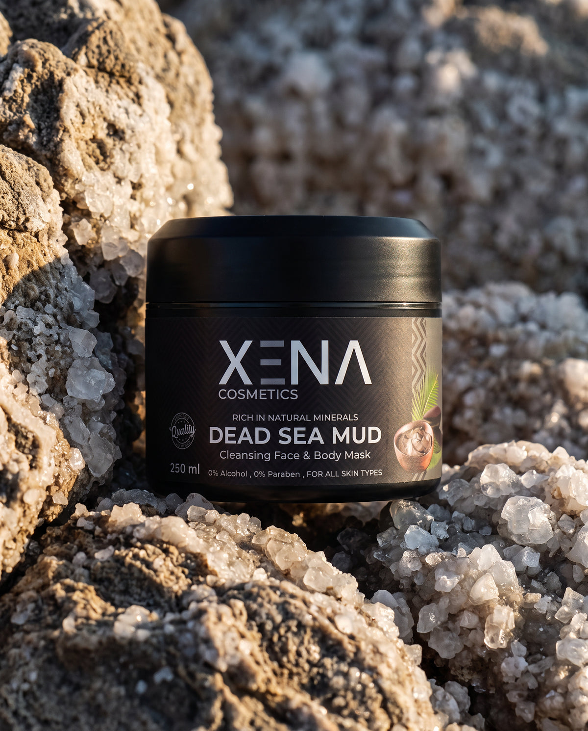 XENA Dead Sea Mud Mask 250 ml jar nestled among Dead Sea salt crystals