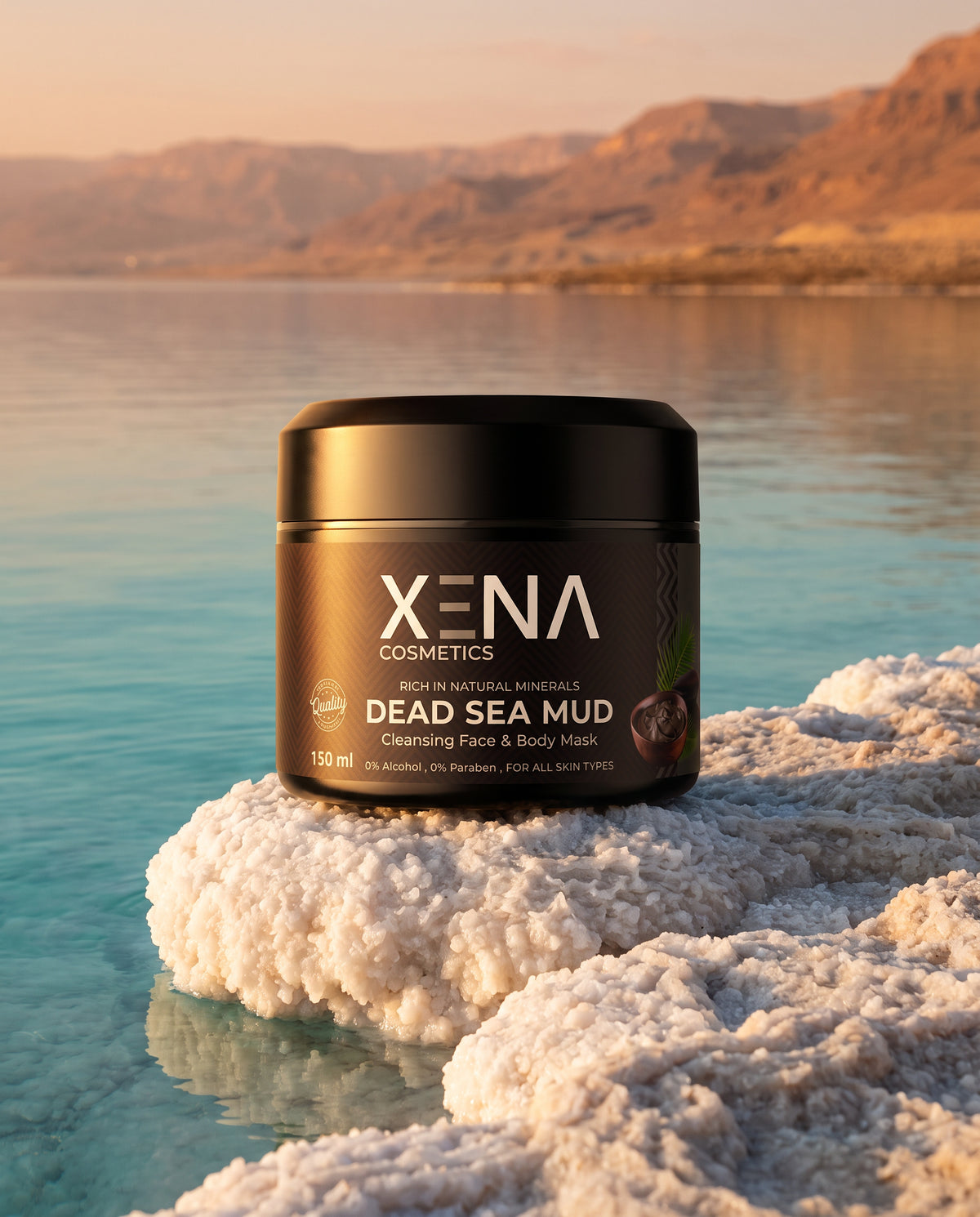 XENA Dead Sea Mud Mask jar on salt crystals by the Dead Sea at golden hour